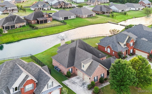 drone / aerial view featuring a water view