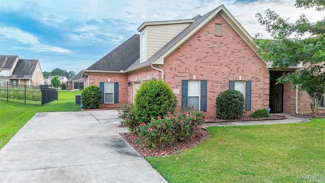 view of front of home with a front lawn