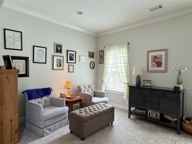 sitting room with light colored carpet and ornamental molding