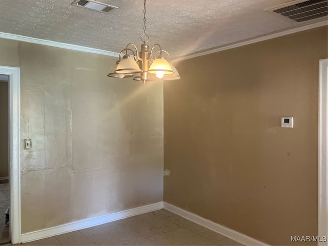 tiled spare room featuring a textured ceiling, crown molding, and a chandelier