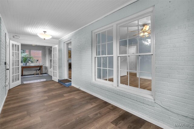 interior space featuring ceiling fan and french doors