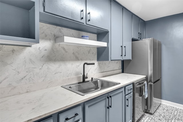 kitchen featuring dishwasher, decorative backsplash, sink, gray cabinetry, and light tile patterned floors