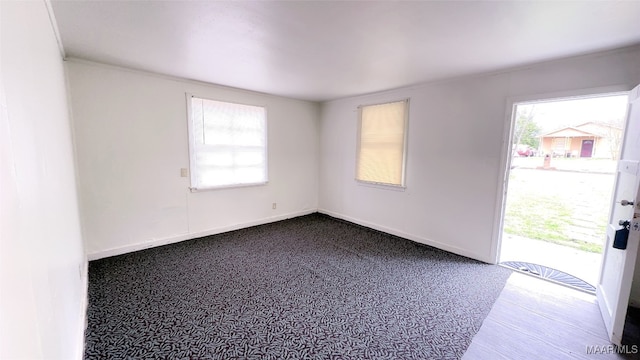 view of carpeted spare room