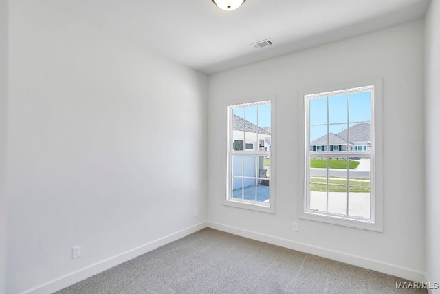 1415 Barret Park Way, Montgomery, AL 36117 - empty room with light carpet and healthy amount of natural light