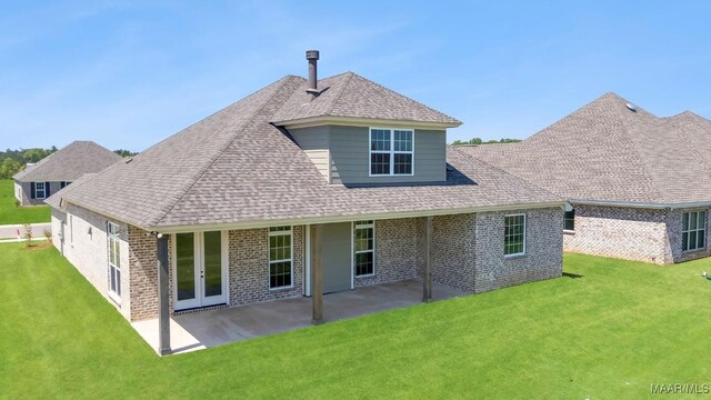 1415 Barret Park Way, Montgomery, AL 36117 - rear view of property with brick siding, a lawn, a patio area, roof with shingles, and french doors