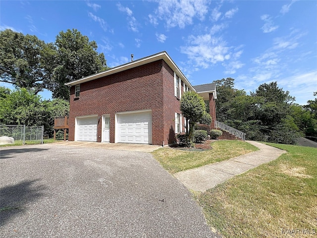 view of property exterior with a garage