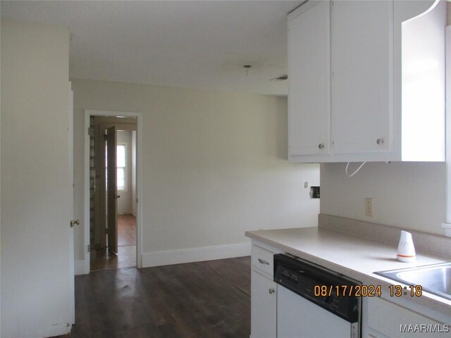 kitchen with white cabinetry, dark hardwood / wood-style floors, and dishwasher