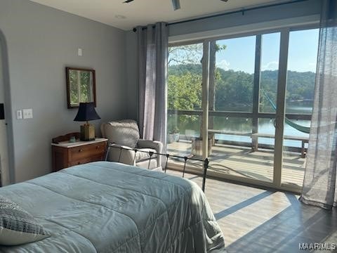 bedroom with wood finished floors