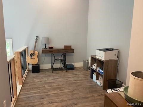 office featuring wood finished floors and baseboards