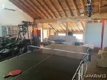 garage featuring wooden ceiling