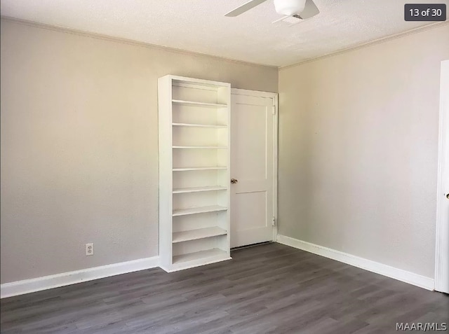 unfurnished bedroom with ceiling fan, a textured ceiling, and wood-type flooring