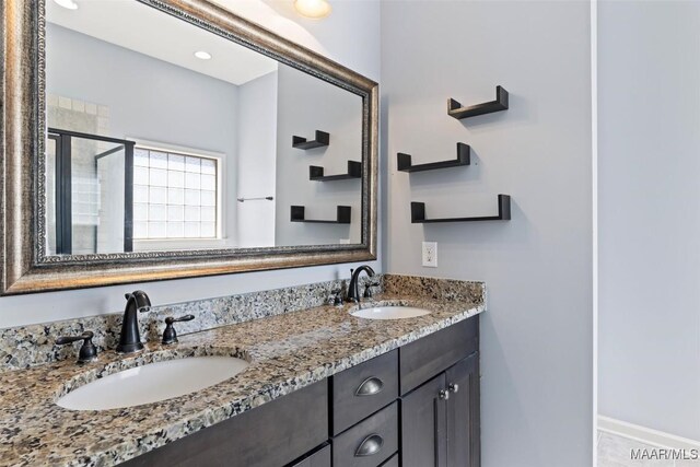 bathroom featuring double sink vanity