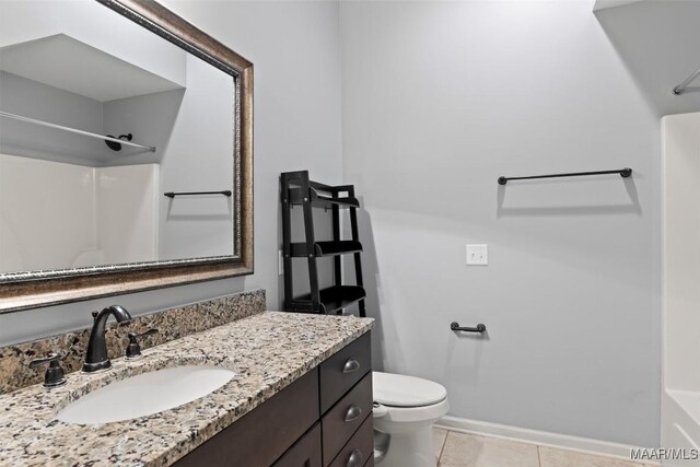 full bathroom with  shower combination, toilet, tile patterned flooring, and vanity