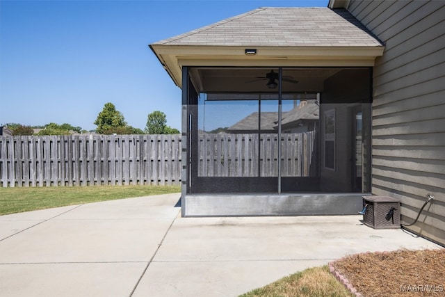 view of patio featuring ceiling fan