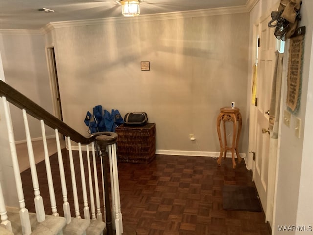 interior space with parquet floors and crown molding