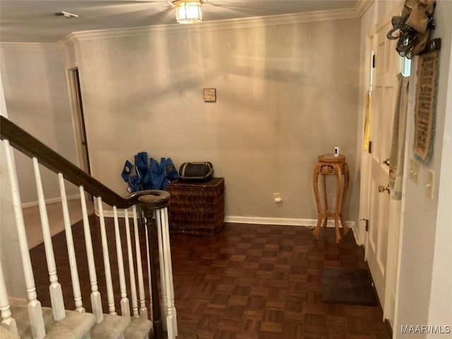 interior space with ornamental molding, stairs, and baseboards