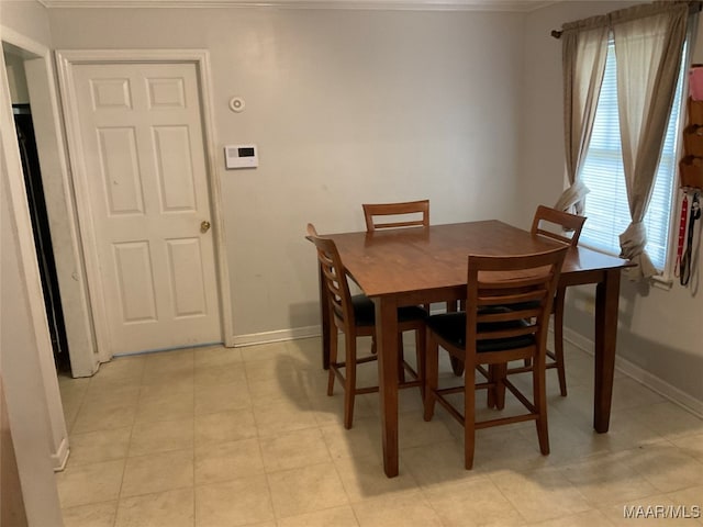 dining space with light tile patterned flooring