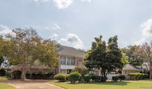 view of front of property with a front lawn