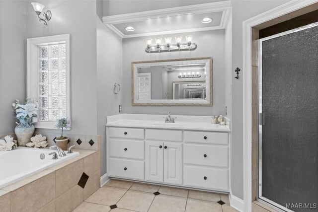 bathroom featuring crown molding, tile patterned floors, independent shower and bath, and vanity