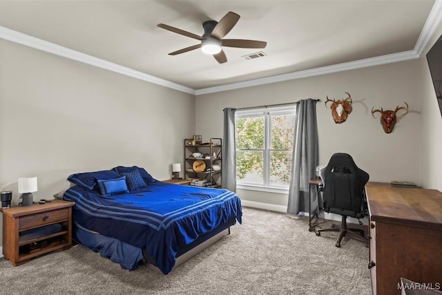 bedroom featuring ceiling fan, carpet, and crown molding