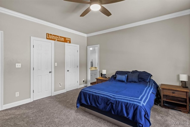 carpeted bedroom with ceiling fan, connected bathroom, and ornamental molding