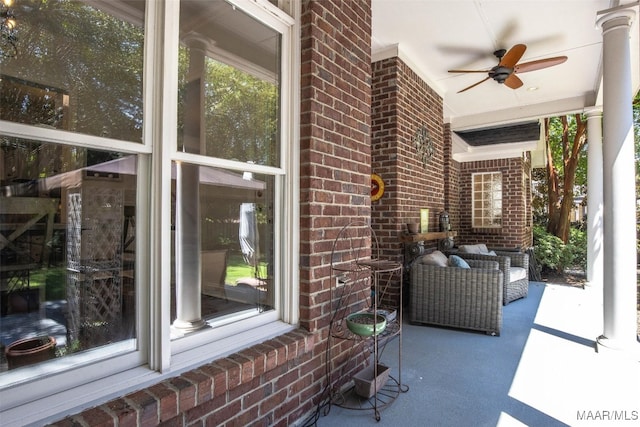 view of patio with ceiling fan