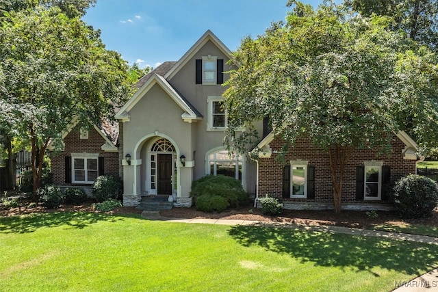 view of front of property with a front lawn