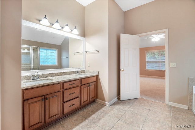 bathroom with ceiling fan, a healthy amount of sunlight, vanity, and tile patterned floors