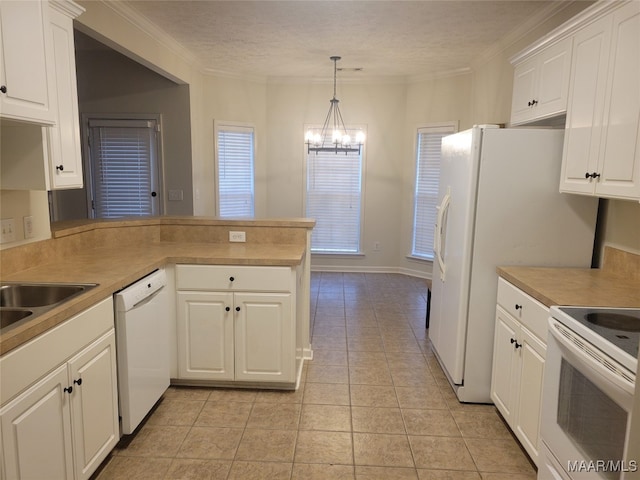 kitchen with white cabinetry, white appliances, kitchen peninsula, and hanging light fixtures