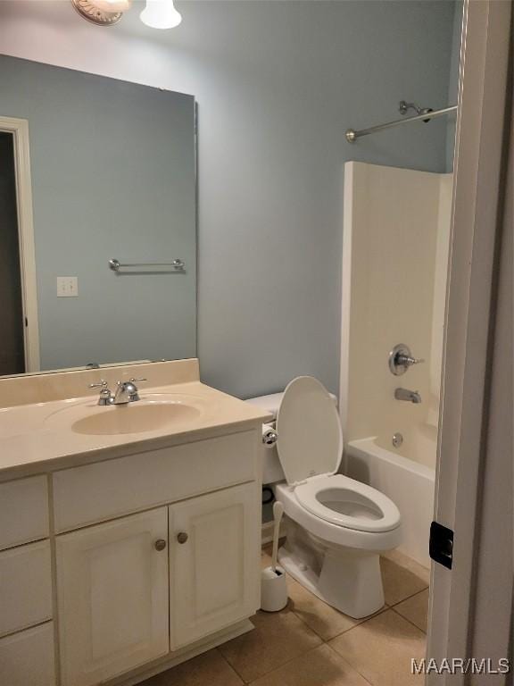 1315 Richton Rd, Montgomery, AL 36117 - bathroom with tile patterned flooring, vanity, toilet, and shower / bathtub combination