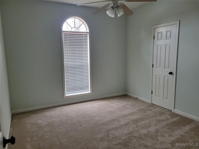 1315 Richton Rd, Montgomery, AL 36117 - carpeted empty room featuring a ceiling fan and baseboards