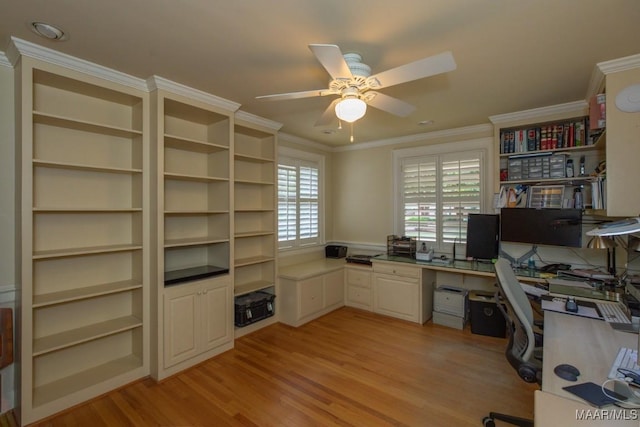 office area featuring ornamental molding, ceiling fan, and light wood finished floors