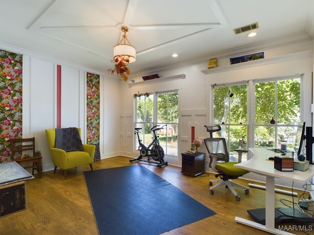 office with a chandelier, dark wood-type flooring, and crown molding