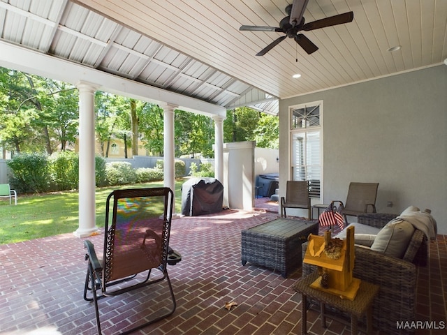 view of patio / terrace featuring ceiling fan and a grill