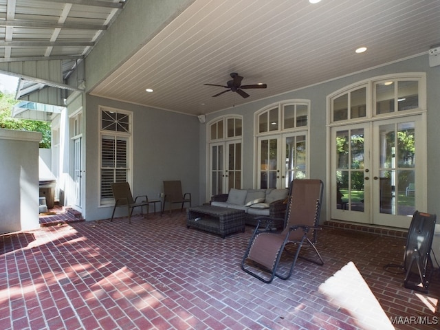 view of patio / terrace with outdoor lounge area, ceiling fan, and french doors