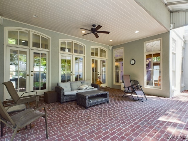 view of patio / terrace featuring outdoor lounge area, ceiling fan, and french doors