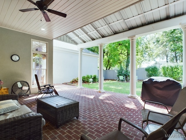 view of patio / terrace featuring area for grilling and ceiling fan