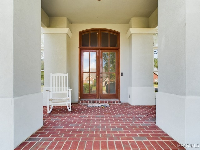 property entrance featuring french doors