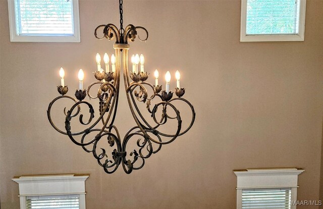 interior details featuring a notable chandelier