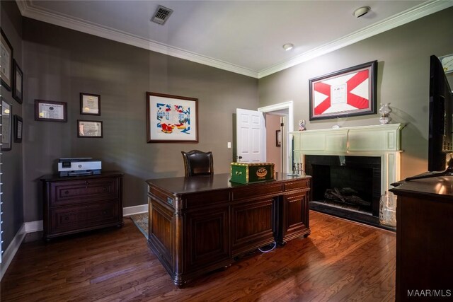 office area with dark hardwood / wood-style flooring and crown molding