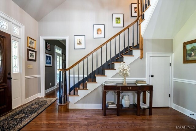 entryway with hardwood / wood-style floors