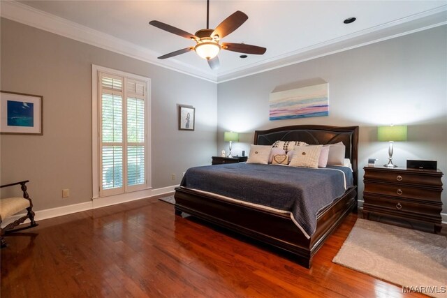 bedroom with ceiling fan, ornamental molding, and wood-type flooring