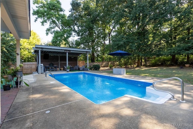 view of pool featuring a fenced in pool, a patio area, and a fenced backyard