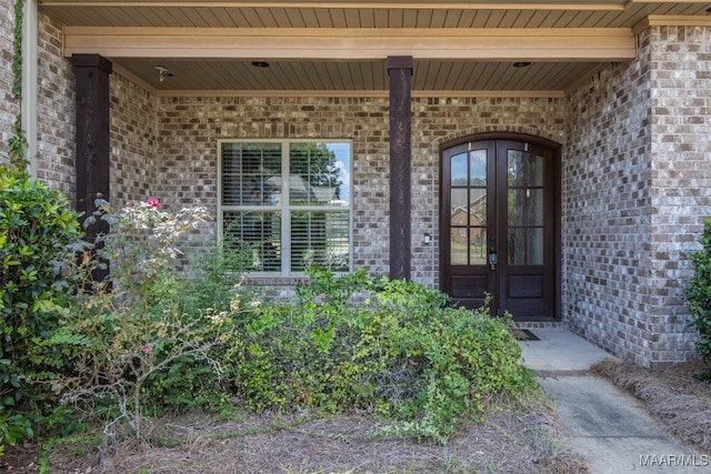 doorway to property featuring french doors