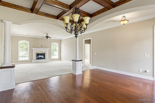 unfurnished living room with hardwood / wood-style floors, coffered ceiling, and ornate columns