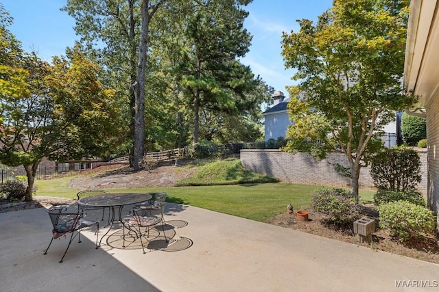 view of patio / terrace with outdoor dining space and fence private yard