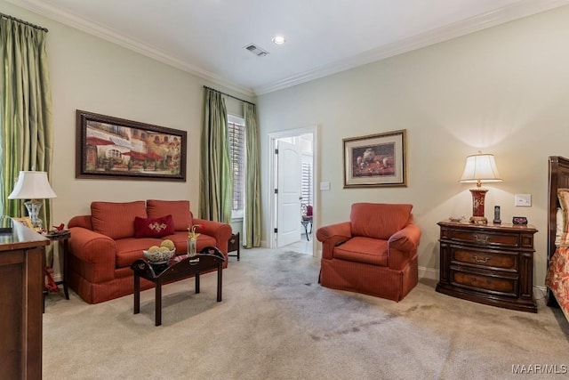 sitting room featuring light carpet, visible vents, and crown molding