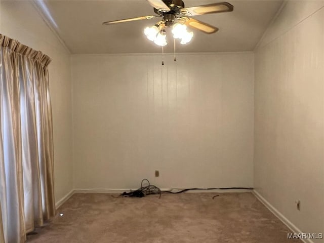 spare room with carpet flooring and ceiling fan