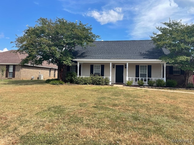 single story home featuring a front lawn and a porch