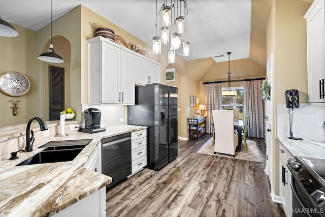 kitchen with sink, hanging light fixtures, backsplash, and dark hardwood / wood-style floors